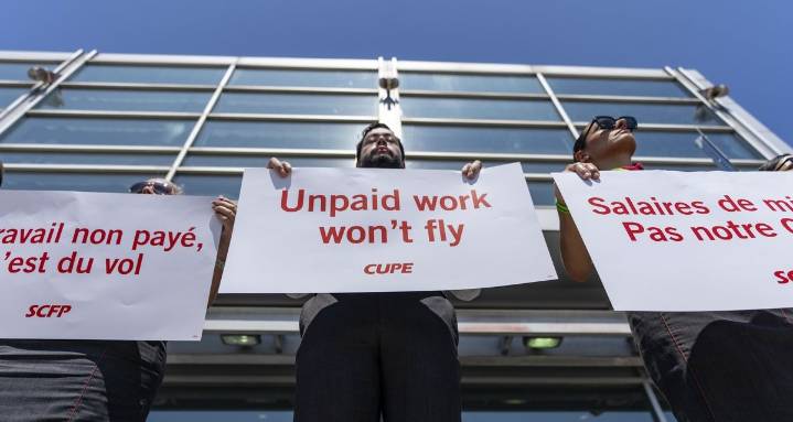 Air Canada flight attendants picket at 4 major airports as bargaining continues