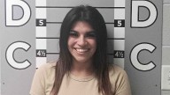 Kentucky woman's smiling mugshot goes viral after she allegedly smashed ex's car