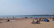 'Disgrace' as hundreds desert Devon beach after pollution alert