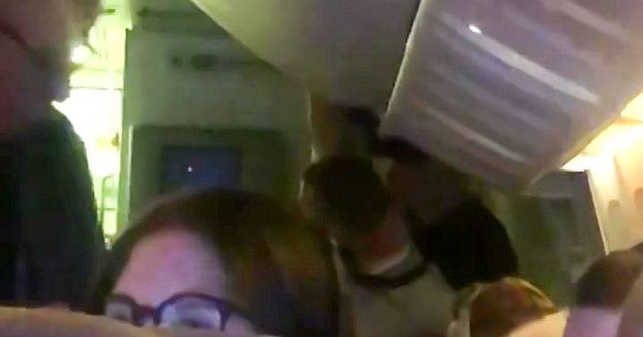 Moment Emirates passenger restrained on plane 'after what he called flight attendant'