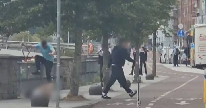 Man beaten and stripped of his clothes in savage street attack in broad daylight