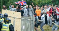 Rioters smash into asylum seeker hotel in horrific scenes as four jailed