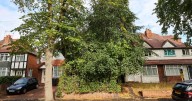 'Invisible' derelict home with 'jungle' garden that hasn't been touched in 20 years sells for £188k