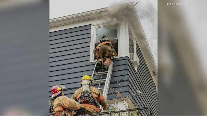 Portland firefighters rescue unconscious man from burning apartment