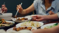 Woman considers skipping family dinners over mother