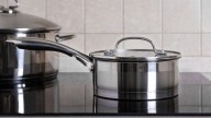 The Household Staple That Will Banish That Weird Blue Tarnish On Your Stainless Steel Pans