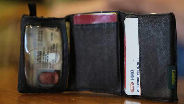 Autoworker's wallet found under a hood after 11 years