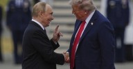 Trump and Putin share handshake in Alaska, a warm greeting belying the bloodshed in Ukraine