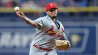 Yadier Molina back in Cardinals' dugout as temporary coach