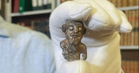 Smiling miniature figurine thought to be first Viking "portrait" unveiled in Denmark