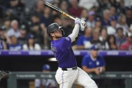 Rockies rough up Ohtani in his 1st start at Coors Field and beat Dodgers 8