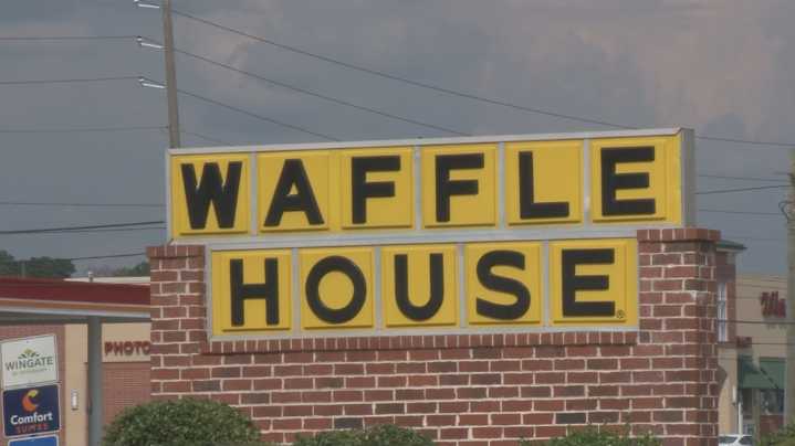 Vacationers shaken after nearby Waffle House shooting damages hotel rooms in North Macon