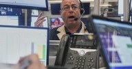 Stocks pull back from their latest all-time highs on Wall Street