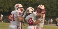 Belfry plays first football game since death of longtime coach