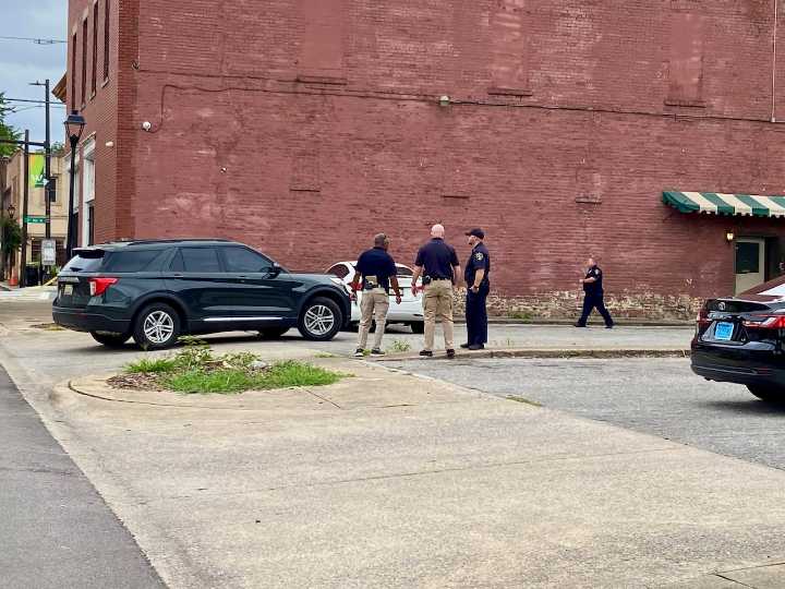 Man shot dead in Woodlawn parking lot as he was about to start work