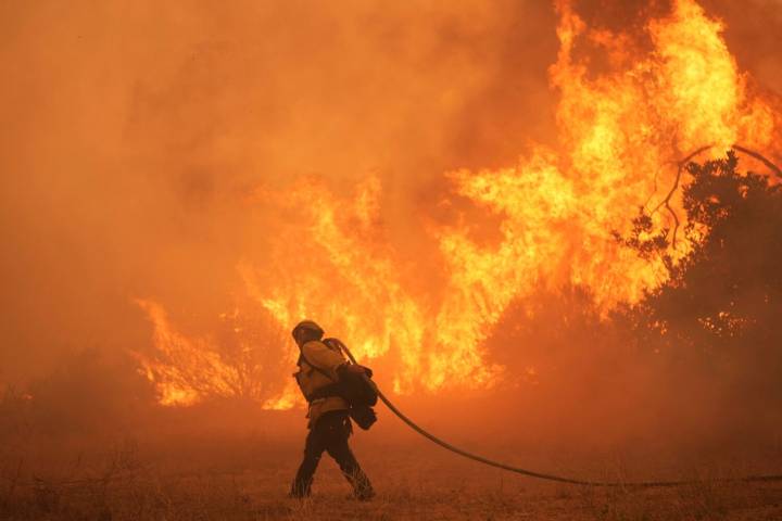 Scientists give harsh grades to Trump administration work aimed at undoing a key climate finding
