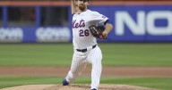 McLean goes 8 innings as Mets blank Phillies 6