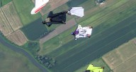 Watch wingsuit skydivers match plane’s 100mph speed at 13,000 feet