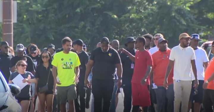 Baltimore groups hand out resources in Park Heights community in aftermath of mass shooting