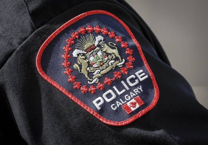 Woman charged after spitting, making racist comments towards liquor store staff: Calgary police