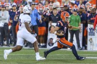 Beatty returns punt for TD, breaks Grange's 102-year-old record in No. 12 Illini's opening rout