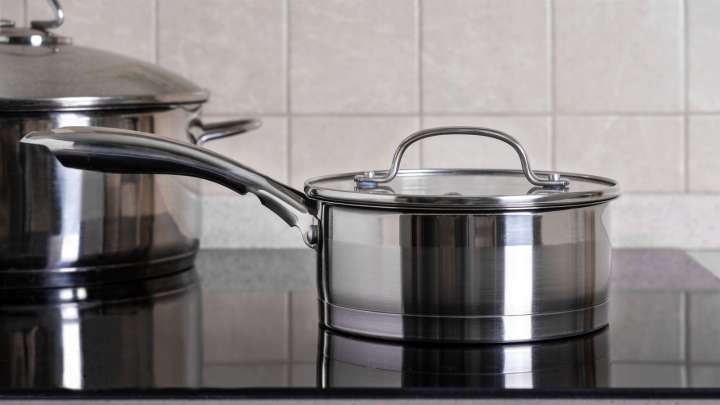 The Household Staple That Will Banish That Weird Blue Tarnish On Your Stainless Steel Pans