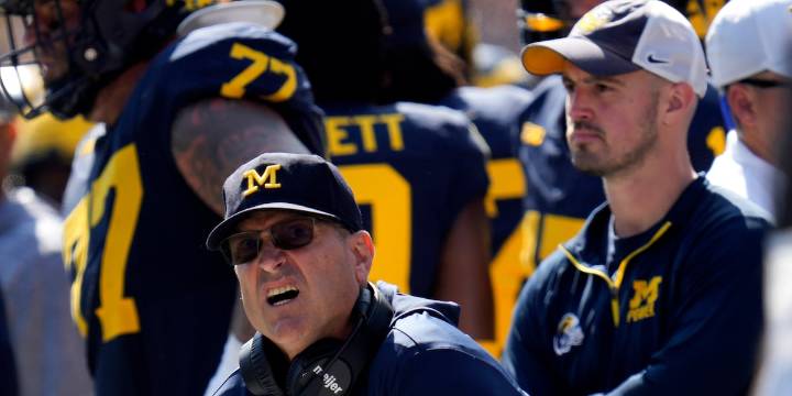 Michigan football fined 10s of millions of dollars in sign