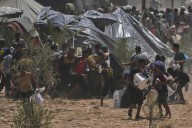 Israel declares Gaza’s largest city a combat zone as the bodies of 2 hostages are recovered