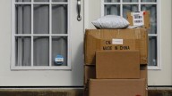 Overseas shippers pause some deliveries to US over tariff changes