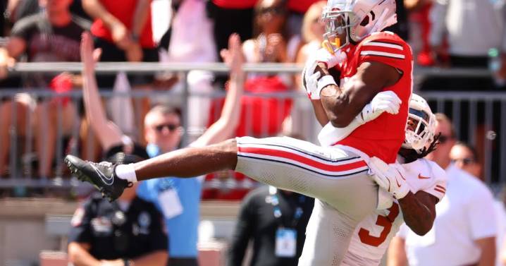 No. 3 Ohio State holds off late rally by No. 1 Texas for season