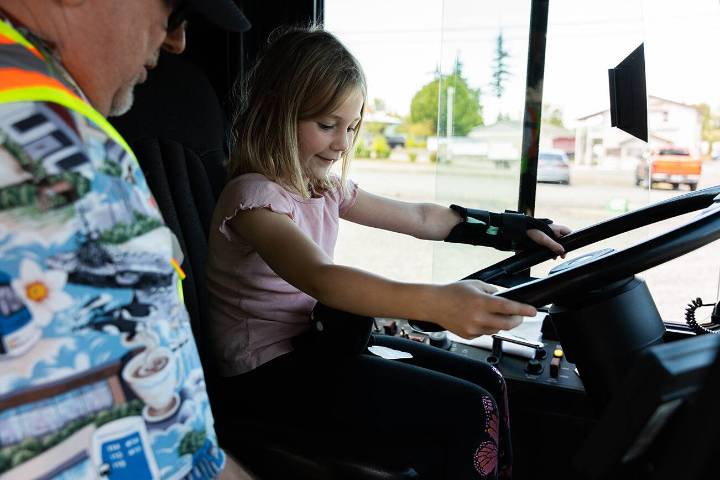 Children explore stories on a bus during ‘Transit Tales’