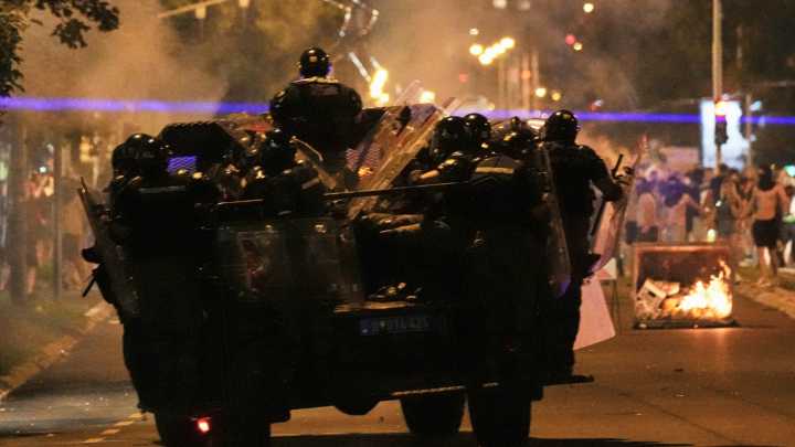 Police chase anti-government protesters in Serbia as president pledges crackdown