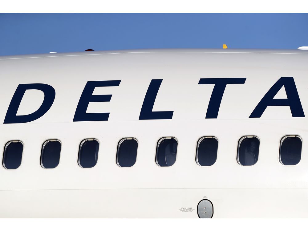 Delta plane wing clips empty aircraft during pushback from gate