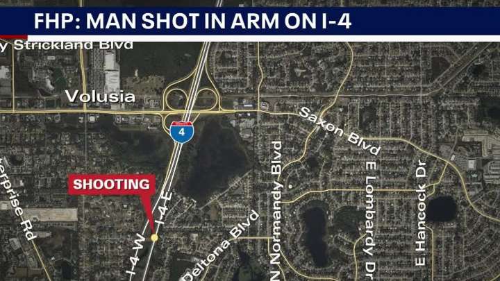 Man shot in arm while driving on I
