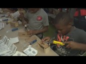 Home Depot Foundation volunteers partner with Boys and Girls Club teaching children how to build cha