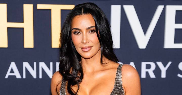Kim Kardashian Modeled Her Face Wrap Wearing a Fur Coat