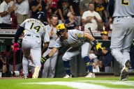 MLB-best Brewers rally again, set franchise single-season record for consecutive victories with 14