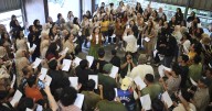 Photos show games, dancing and singing bringing people together in Indonesia
