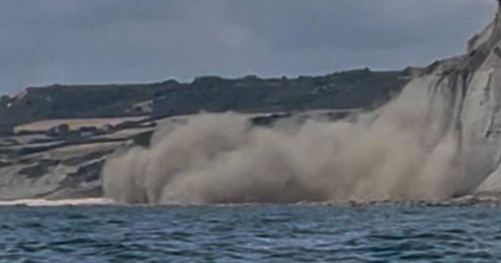 Moment cliff collapses in front of startled kayaker captured on camera