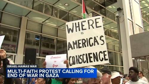 Rev. Michael Pfleger of St. Sabina Church leads multi-faith Chicago protest outside Israeli Consulate in Loop