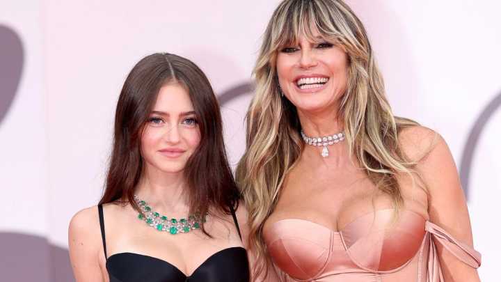 Heidi Klum busts out of nude corset gown as she holds hands with daughter Leni, 21, at Venice Film Festival red carpet