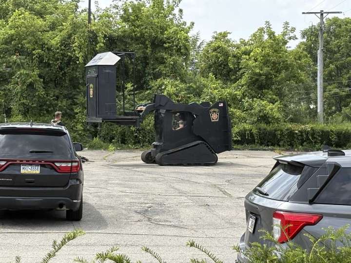 Coroner called Mercer County hotel following officer