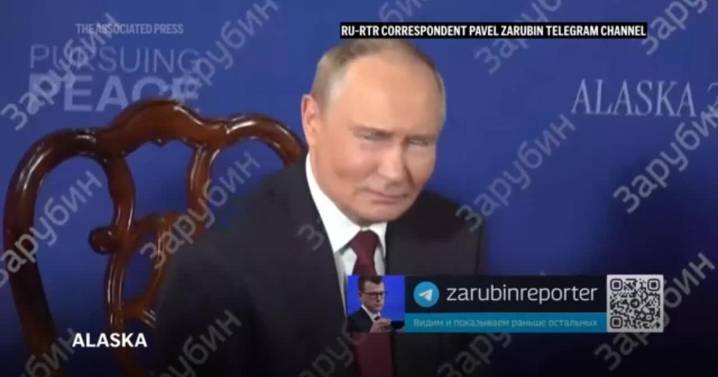 Watch Putin's reaction to shouted questions from reporters at the Alaska meeting