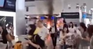 Milan Malpensa Airport passenger 'ran for her life' as rampaging man starts fire