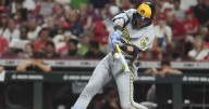 Yelich hits 2 HRs as MLB-best Brewers rally past Reds 10-8, tie club record with 13th straight win