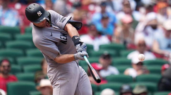 Yankees use four-run ninth inning to sweep Cardinals