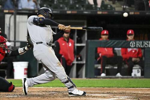 Grisham helps the Yankees beat the White Sox 10