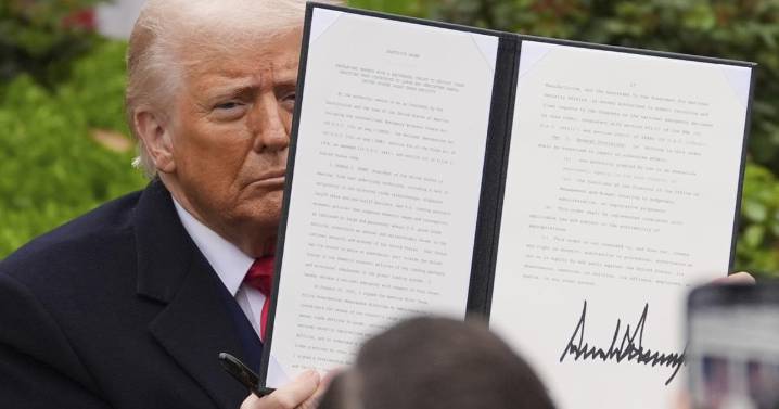 Trump's tariffs go into effect as economic pain resurfaces