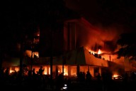 3 dead after mob sets fire to Indonesian regional parliament building amid week of protests