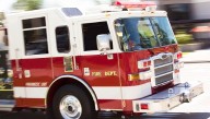 2 arrested, charged in connection with fire at Marion C. Moore Health Science Academy